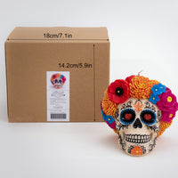 A box of Floral Skull Scented Candle.