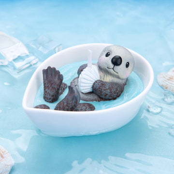 A Cute Sea Otter Baby Scented Candle from Southlake Gifts.