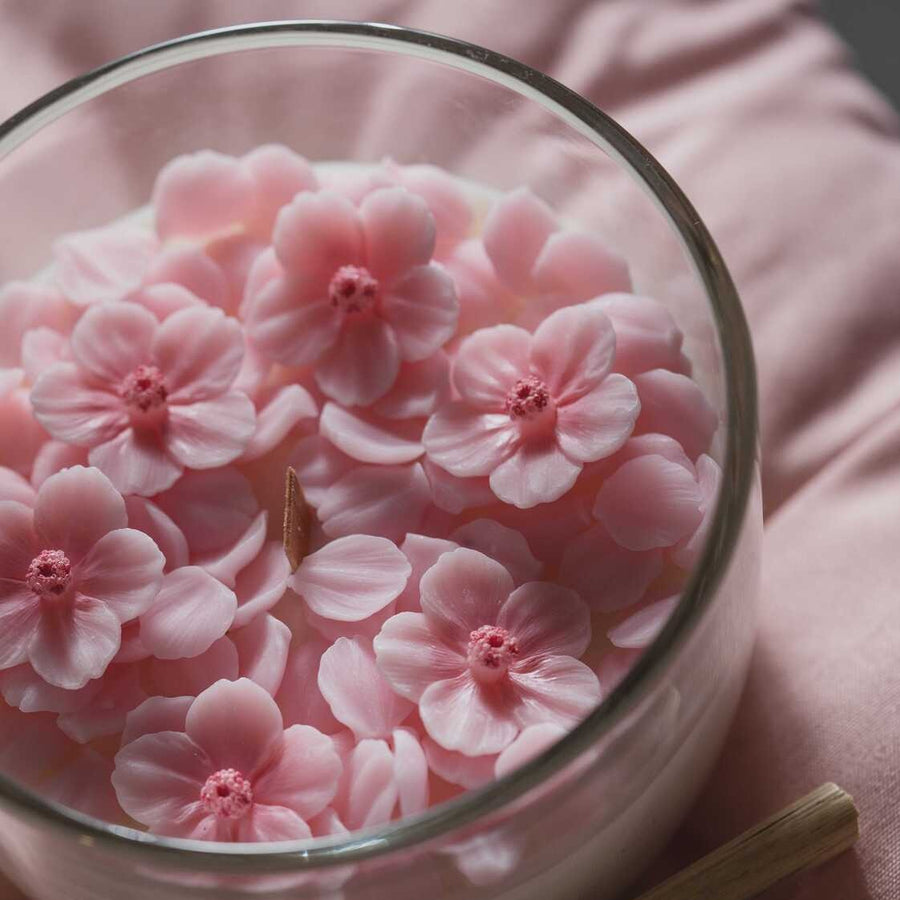 Create a warm and inviting atmosphere with this Romantic Sakura Cup Scented Candle from Southlake Gifts.
