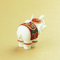 The back details of Lucky Elephant Candle.