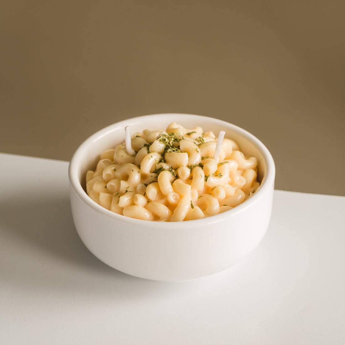Southlake Gifts Macaroni & Cheese Pasta Candle on a clean white tabletop — realistic butter cheese candle bowl made from soy wax, ideal for gifting during holidays, birthdays, or housewarmings.