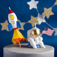  A Rocket and Spaceman US Flag Candle from Southlake Gifts.
