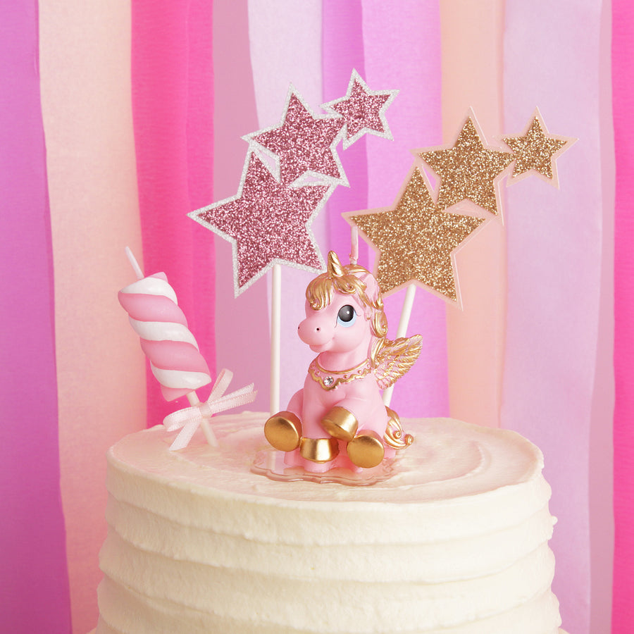 A beautiful stars with a marshmallow and a Pink Unicorn Candle topper for your birthday cake.